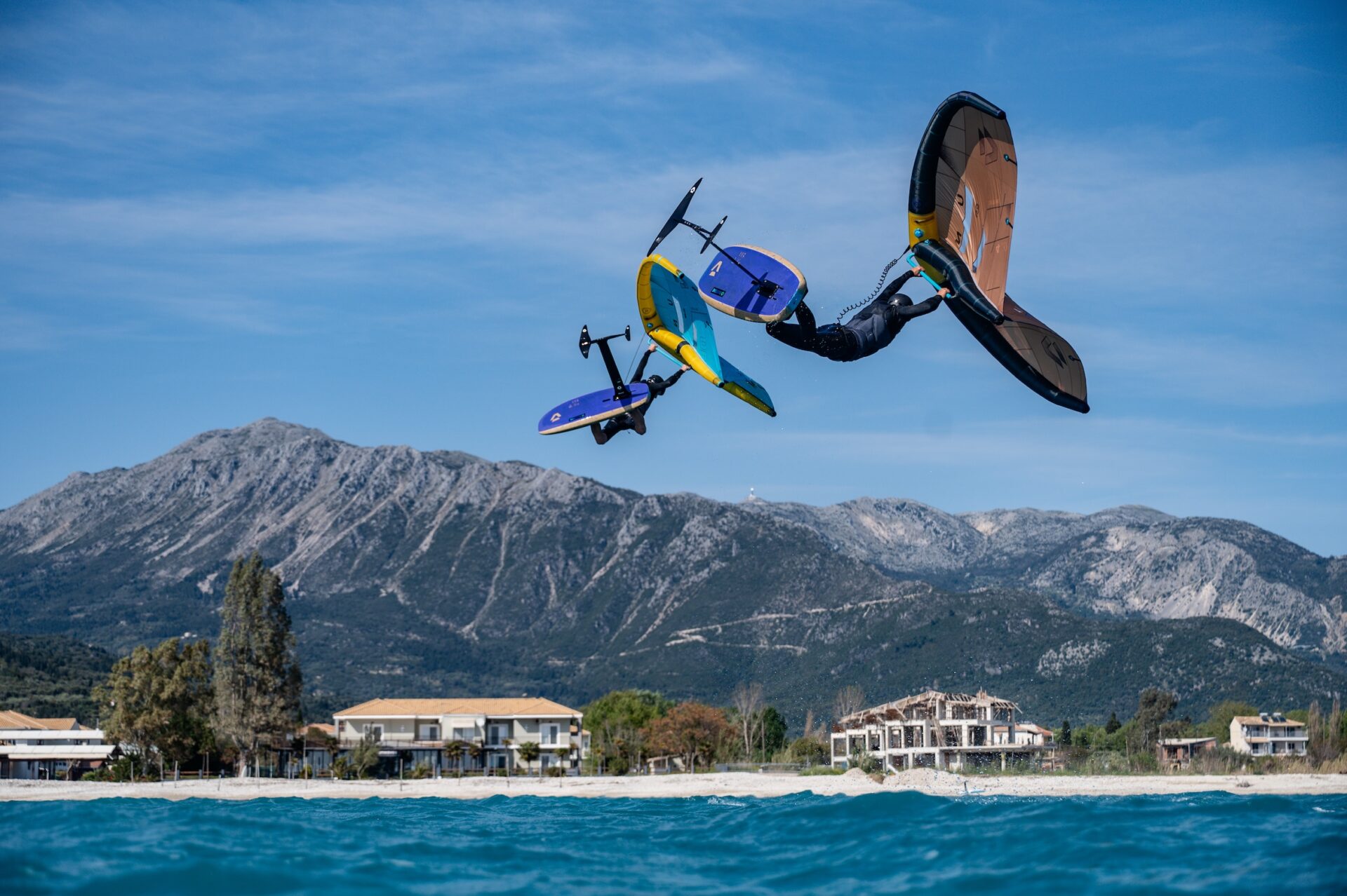 Wing-foil double raley in front of Vass Beach House wing-foil shop & rental