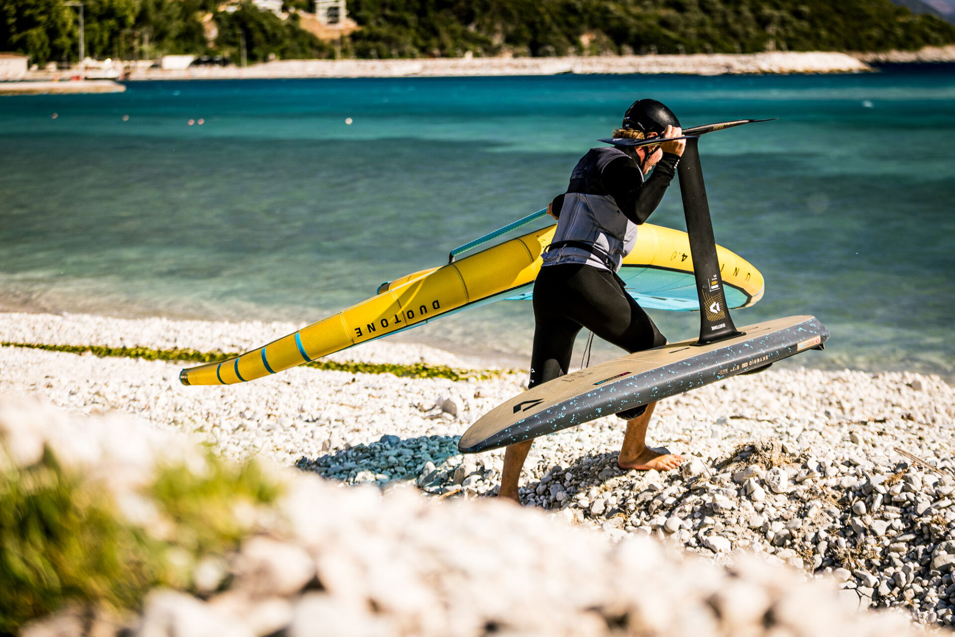 max-rowe-wing-foiling-vasiliki-lefkada Co-founder of Vass Beach House Max Rowe going wing-foiling in Vassiliki on hired gear from the Wing-foil rental in Vassiliki
